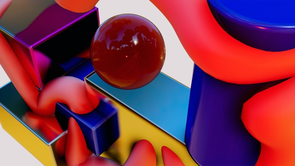 a red ball sitting on top of a colorful object