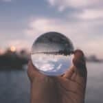 person holding crystal ball